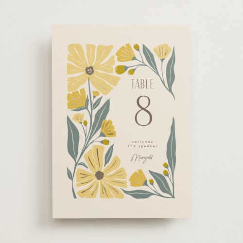 This is a buttercup table numbers with foil pressed by Karidy Walker called storybook garden printing on doublethick in standard