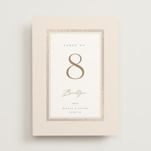 This is a latte table numbers with foil pressed by Kristie Kern called soleil printing on doublethick in standard