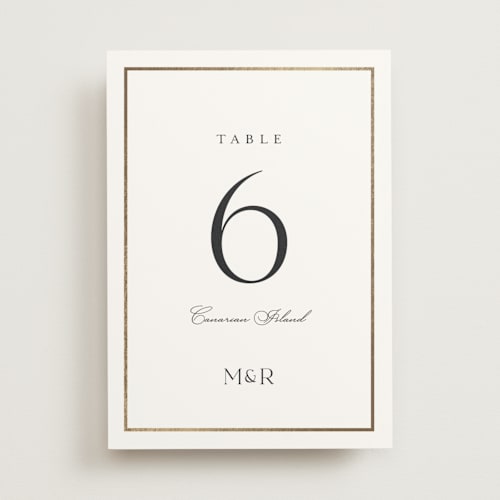 This is a moonstone table numbers with foil pressed by Lucrecia Caporale called timeless charm printing on doublethick in standard