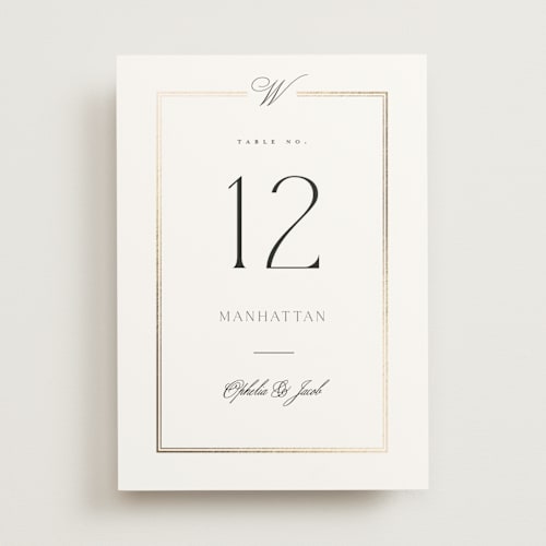 This is a pearl table numbers with foil pressed by Leah Bisch called elegant type printing on doublethick in standard