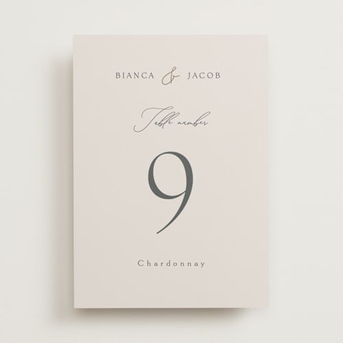 This is a ivory table numbers with foil pressed by Angela Thompson called eloquent printing on doublethick in standard