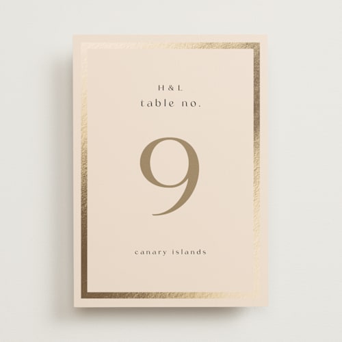 This is a latte table numbers with foil pressed by Stacy Maalouf called framed photo printing on doublethick in standard