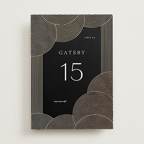 This is a onyx table numbers with foil pressed by Lori Wemple called ionic printing on doublethick in standard