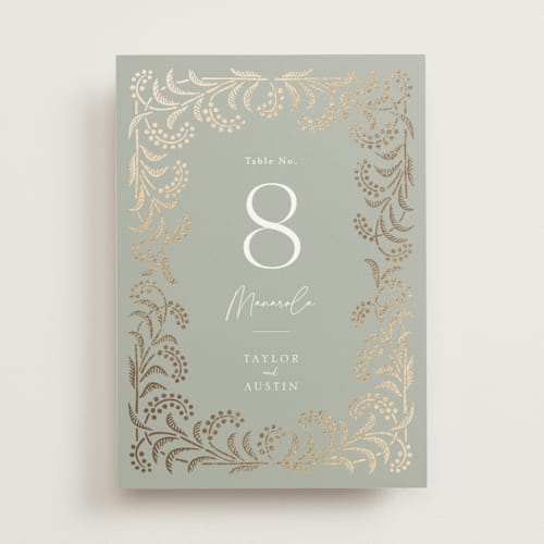 This is a willow table numbers with foil pressed by Leia Matt called riviera printing on doublethick in standard