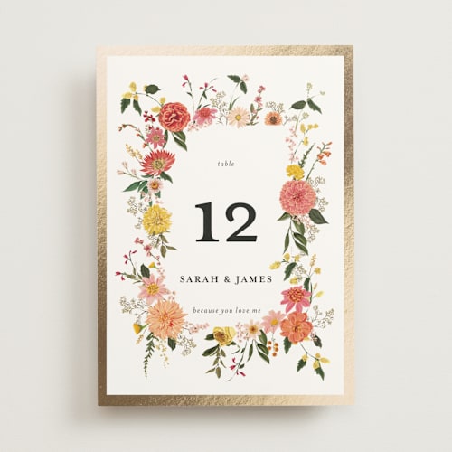 This is a burgundy table numbers with foil pressed by Susan Moyal called enchanting printing on doublethick in standard