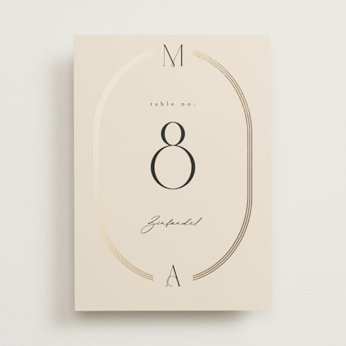 This is a latte table numbers with foil pressed by Kristie Kern called misha printing on doublethick in standard