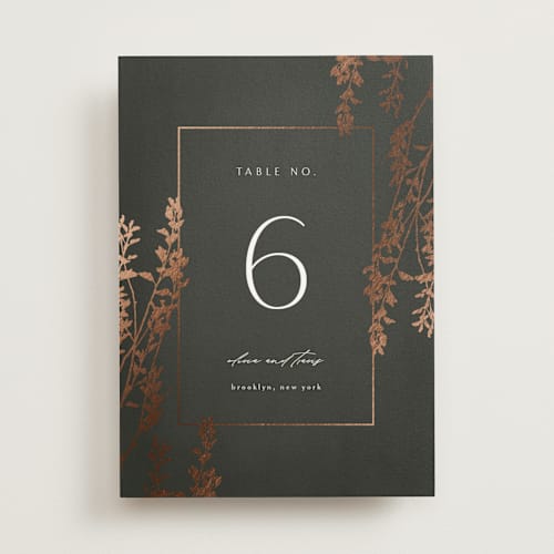 This is a ivy table numbers with foil pressed by Kelly Schmidt called quince printing on doublethick in standard