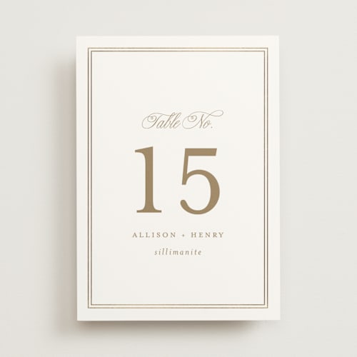 This is a porcelain table numbers with foil pressed by Mansi Verma called chic monogram printing on doublethick in standard