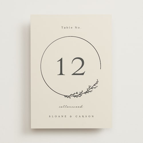 This is a almond table numbers with foil pressed by Brianne Larsen called branched printing on doublethick in standard