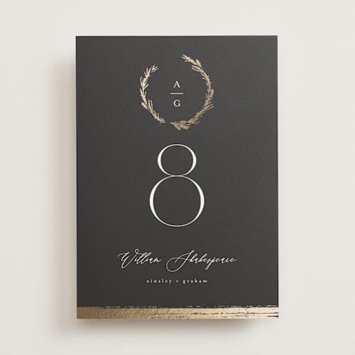This is a onyx table numbers with foil pressed by Kristie Kern called panache printing on doublethick in standard
