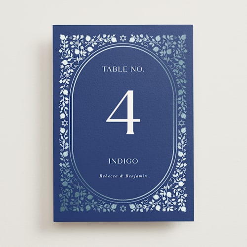 This is a royal table numbers with foil pressed by Nam Bourassa called pomegranate floral frame printing on doublethick in standard