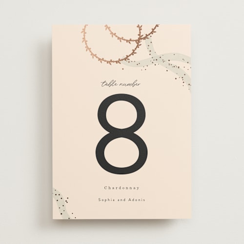 This is a linen table numbers with foil pressed by Maria Hilas-Louie called stefana printing on doublethick in standard