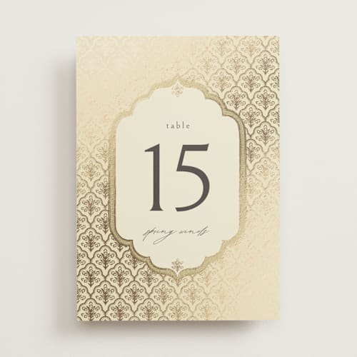 This is a marigold table numbers with foil pressed by Pati Cascino called aatreya printing on doublethick in standard