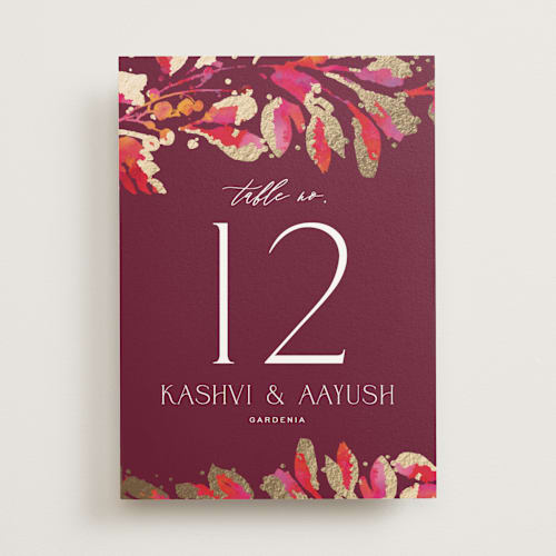 This is a sangria table numbers with foil pressed by Jessica Corliss called bright abstract printing on doublethick in standard