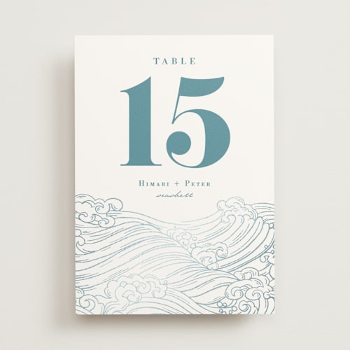 This is a aqua table numbers with foil pressed by Jessie Steury called waves printing on doublethick in standard