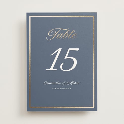 This is a cornflower table numbers with foil pressed by Nicole Walsh called tux printing on doublethick in standard