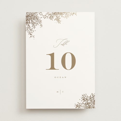 This is a porcelain table numbers with foil pressed by Leah Bisch called reflection printing on doublethick in standard