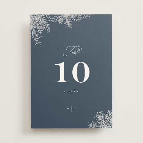This is a deep sea table numbers with foil pressed by Leah Bisch called reflection printing on doublethick in standard