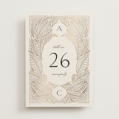 This is a cream table numbers with foil pressed by Jen Owens called royalty printing on doublethick in standard