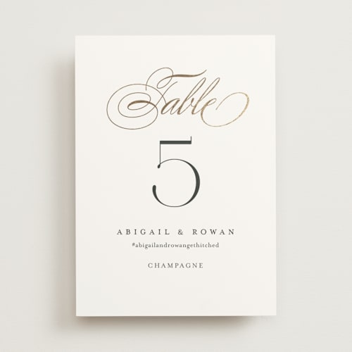 This is a chantilly table numbers with foil pressed by Jessica Williams called initialed printing on doublethick in standard
