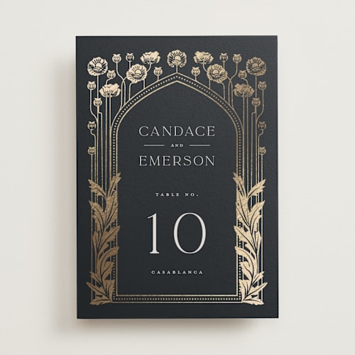 This is a navy table numbers with foil pressed by Ana de Sousa called nouveau flowers printing on doublethick in standard
