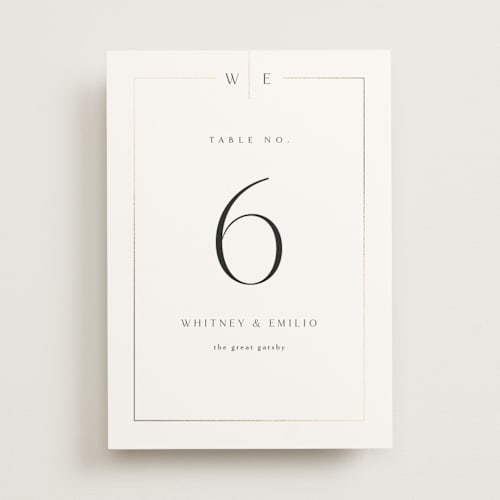 This is a silk table numbers with foil pressed by Kelly Schmidt called arcadia printing on doublethick in standard