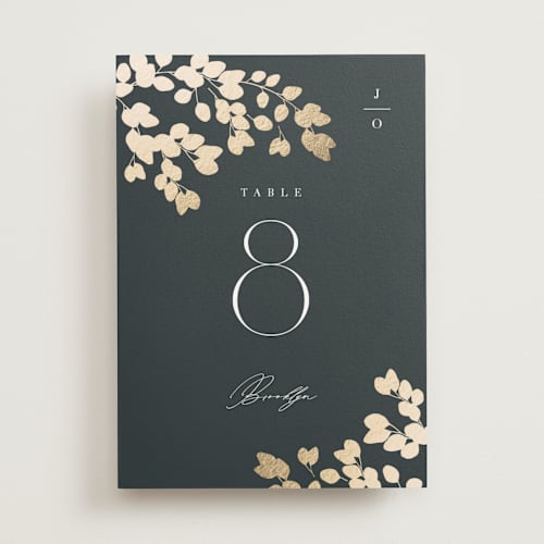 This is a deep sea table numbers with foil pressed by Kristie Kern called loire printing on doublethick in standard