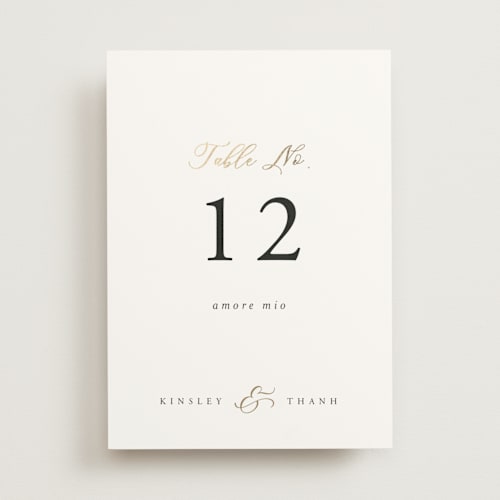 This is a classique table numbers with foil pressed by Design Lotus called you & me printing on doublethick in standard