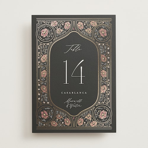 This is a ebony table numbers with foil pressed by Ana de Sousa called timeless nature printing on doublethick in standard