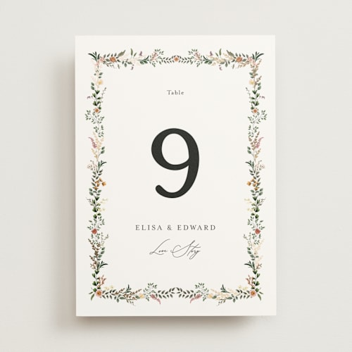 This is a blush table numbers with foil pressed by Susan Moyal called blooming vine printing on doublethick in standard