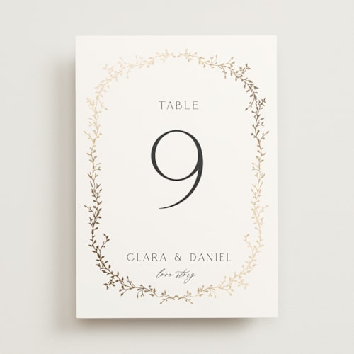 This is a alabaster table numbers with foil pressed by Susan Moyal called delicate vine printing on doublethick in standard