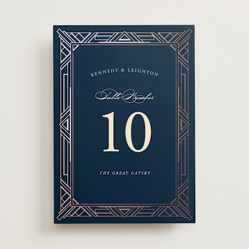 This is a navy table numbers with foil pressed by Hooray Creative called opulent border printing on doublethick in standard