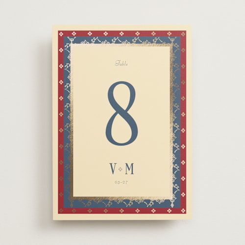 This is a navy table numbers with foil pressed by Baumbirdy called woven printing on doublethick in standard