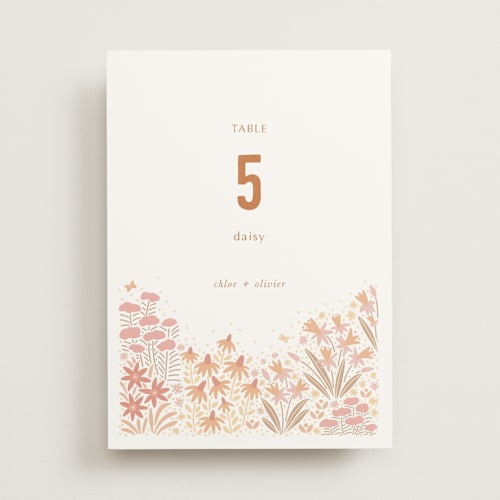 This is a peach table numbers with standard by Pippa Shaw called floral border printing on doublethick in standard