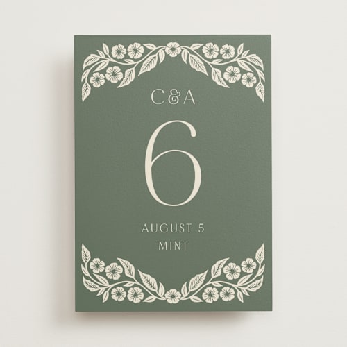 This is a eucalyptus table numbers with standard by Katharine Watson called floral diamond printing on doublethick in standard