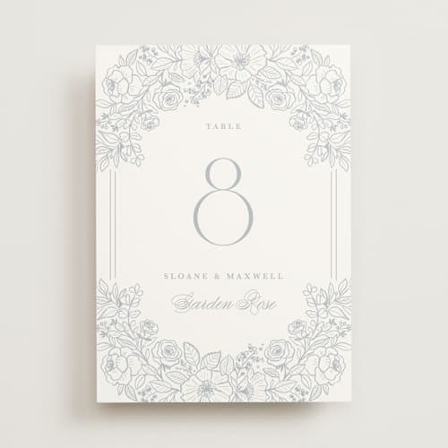 This is a powder blue table numbers with standard by Kristen Smith called wild roses printing on doublethick in standard