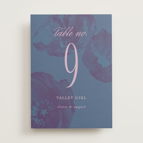 This is a peacock table numbers with standard by Morgan Kendall called maximalist poppies printing on doublethick in standard