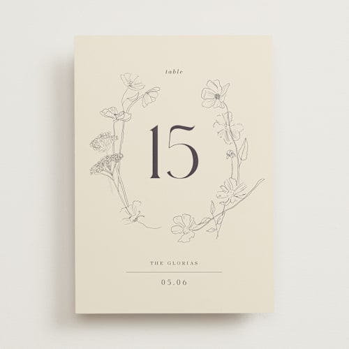 This is a ivory table numbers with standard by Baumbirdy called floral stamp printing on doublethick in standard
