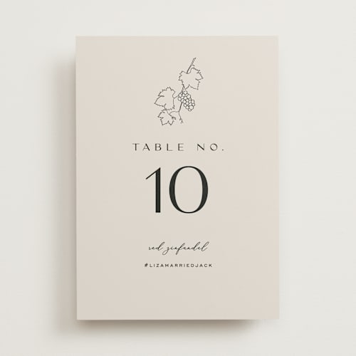 This is a stone table numbers with standard by Owl and Toad called wine label printing on doublethick in standard