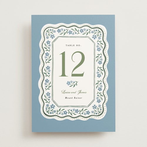 This is a periwinkle table numbers with standard by Alethea and Ruth called sweet vintage printing on doublethick in standard