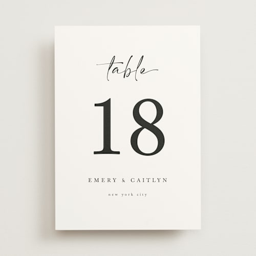 This is a ivory table numbers with standard by Adelyn T. called ink scribble printing on doublethick in standard
