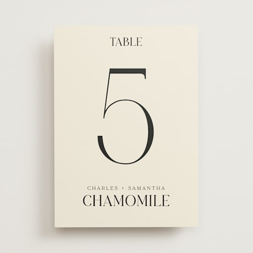This is a cream table numbers with standard by Baumbirdy called floral emblem printing on doublethick in standard