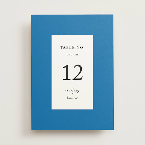 This is a cobalt table numbers with standard by mo kelley called swirl frame printing on doublethick in standard