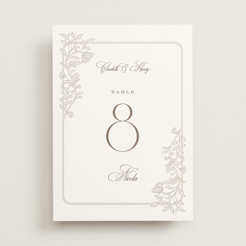 This is a natural table numbers with standard by BR Designs called vintage flourishes printing on doublethick in standard