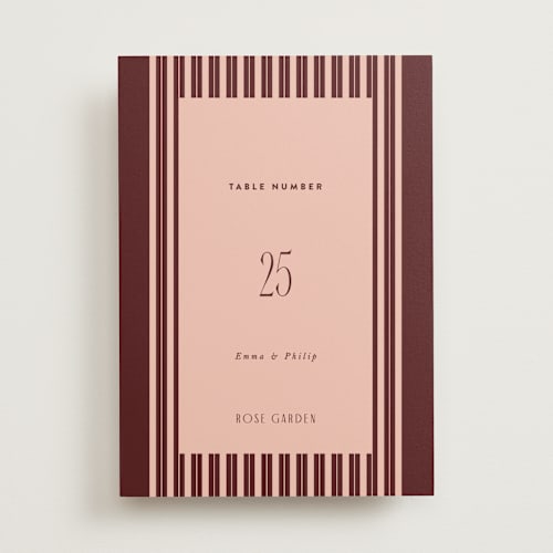 This is a burgundy table numbers with standard by Nazia Hyder called museum printing on doublethick in standard