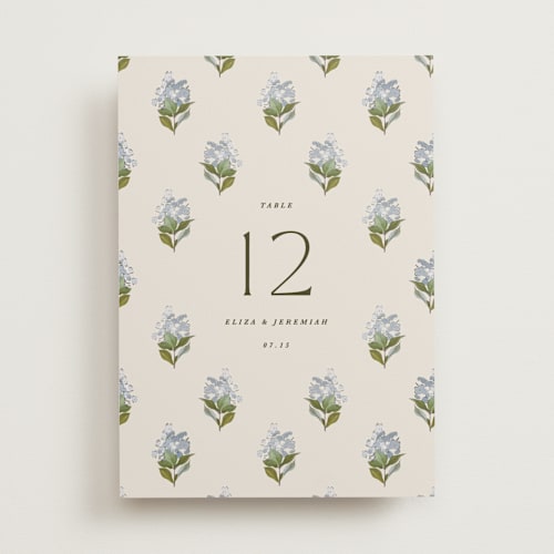 This is a almond table numbers with standard by Olivia Kanaley Inman called blockprint printing on doublethick in standard