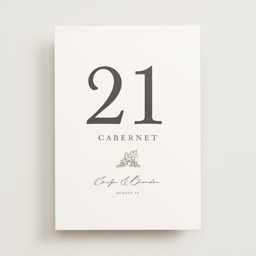This is a olive table numbers with standard by Sarah Brown called vineyard printing on doublethick in standard