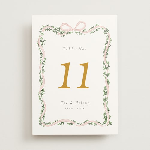 This is a blush table numbers with standard by Itsy Belle Studio called ribbonly frame printing on doublethick in standard