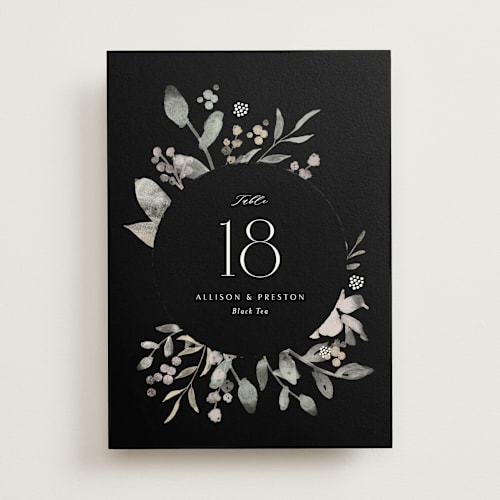 This is a noir table numbers with standard by Jennifer Wick called enchanted fields printing on doublethick in standard