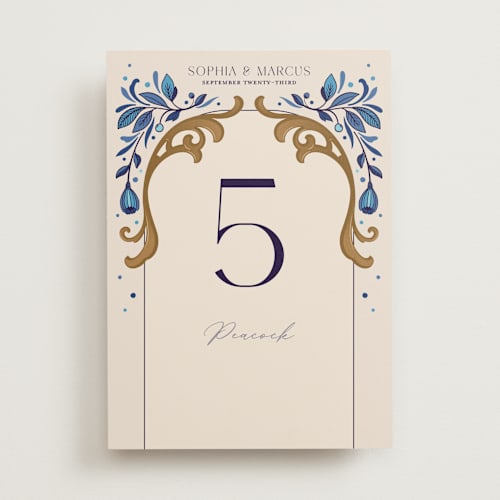 This is a cerulean table numbers with standard by GeekInk Design called gilded printing on doublethick in standard